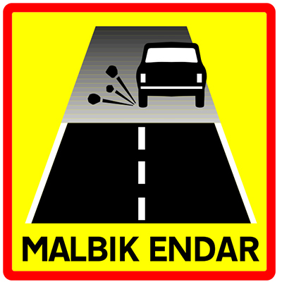 Road changes from paved to gravel